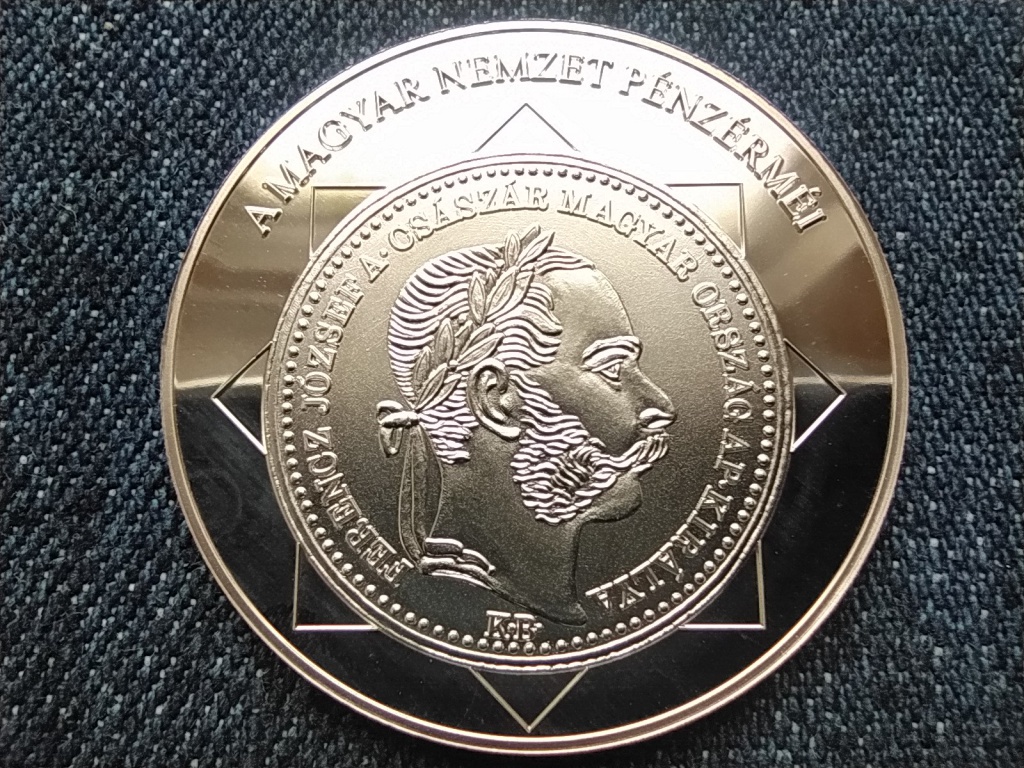 A magyar nemzet p&eacute;nz&eacute;rm&eacute;i A Monarchia első p&eacute;nze 1867-1916 .999 ez&uuml;st