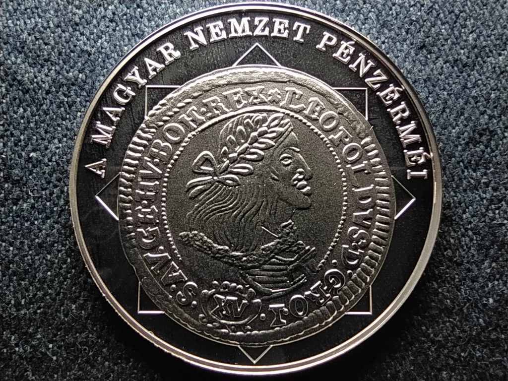 A magyar nemzet p&eacute;nz&eacute;rm&eacute;i N&eacute;v&eacute;rt&eacute;k megjelen&eacute;se magyar p&eacute;nzen 1657-1705 .999 ez&uuml;st