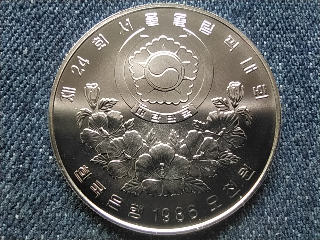 D&eacute;l-Korea Olimpiai J&aacute;t&eacute;kok Sz&ouml;ulban 1988 K&ouml;t&eacute;lh&uacute;z&aacute;s .925 ez&uuml;st 5000 won