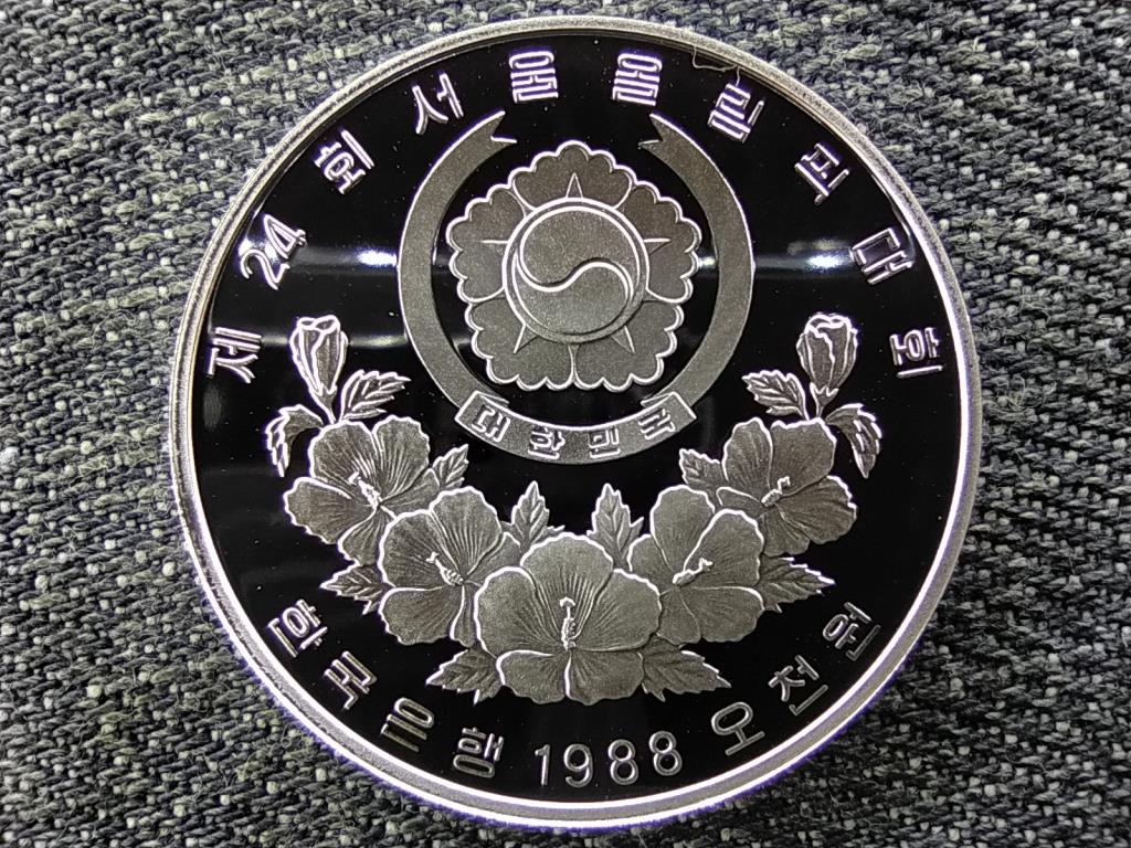 D&eacute;l-Korea Olimpiai J&aacute;t&eacute;kok Sz&ouml;ulban 1988 B&uacute;g&oacute;csiga .925 ez&uuml;st 5000 won