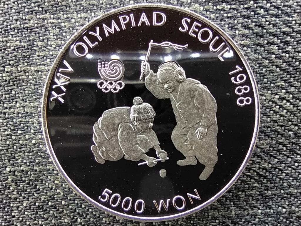D&eacute;l-Korea Olimpiai J&aacute;t&eacute;kok Sz&ouml;ulban 1988 B&uacute;g&oacute;csiga .925 ez&uuml;st 5000 won